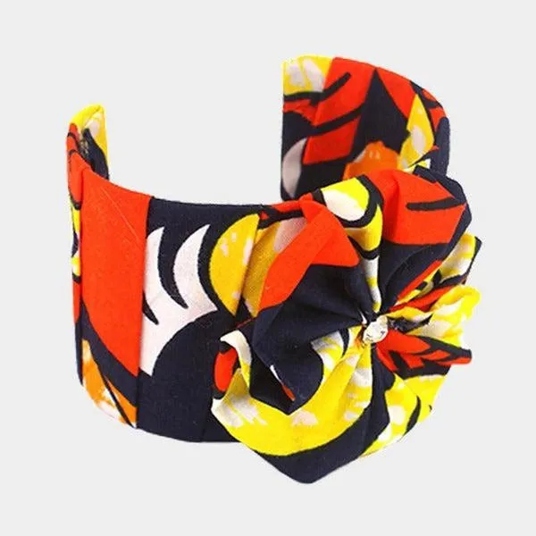 Patterned Orange Fabric Flower Accented Cuff Bracelet